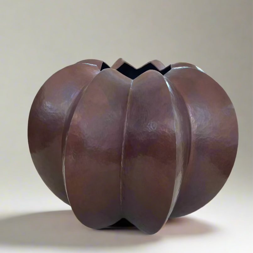 LARGE HAMMERED COPPER VESSEL
