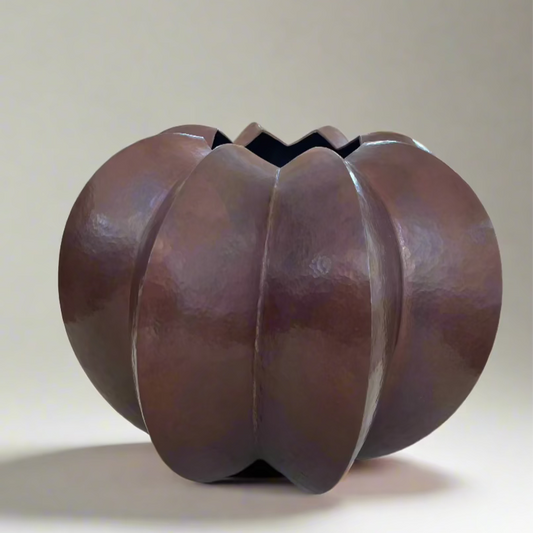 LARGE HAMMERED COPPER VESSEL